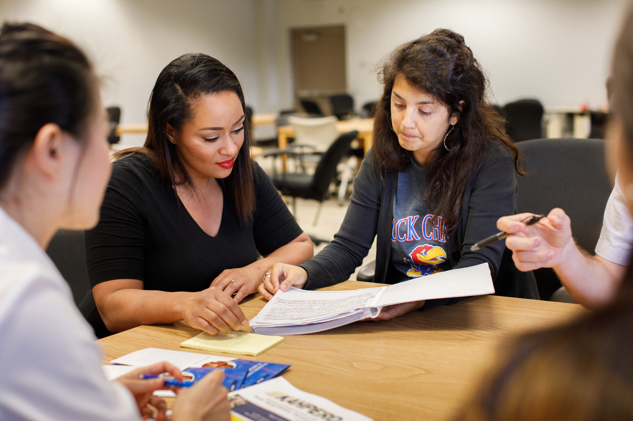 Students review notes together