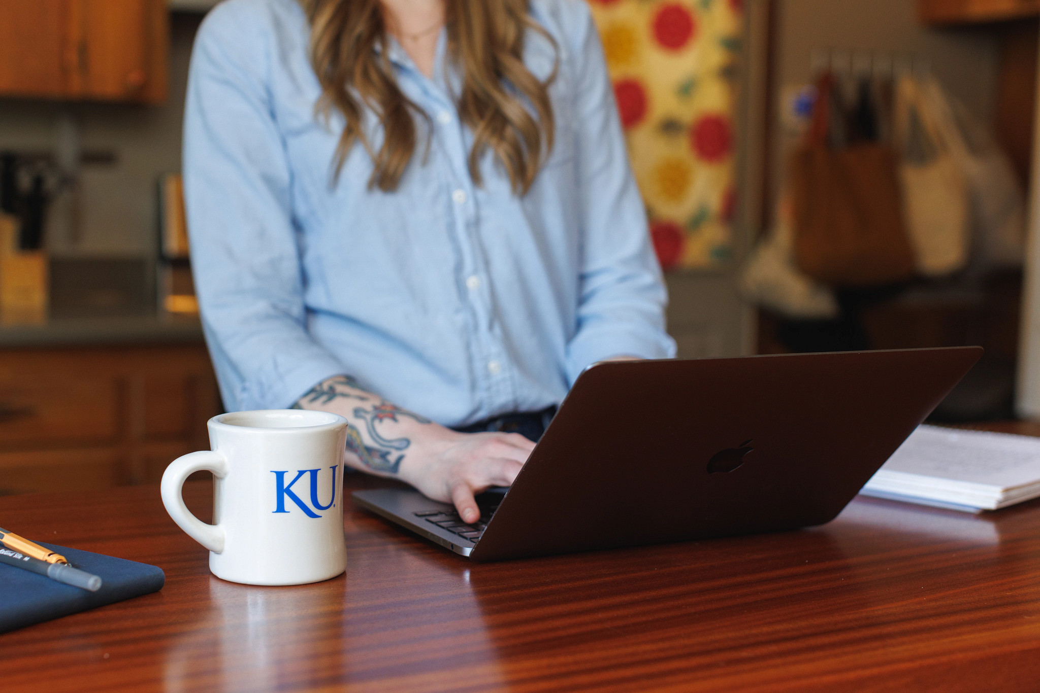 A student uses a laptop